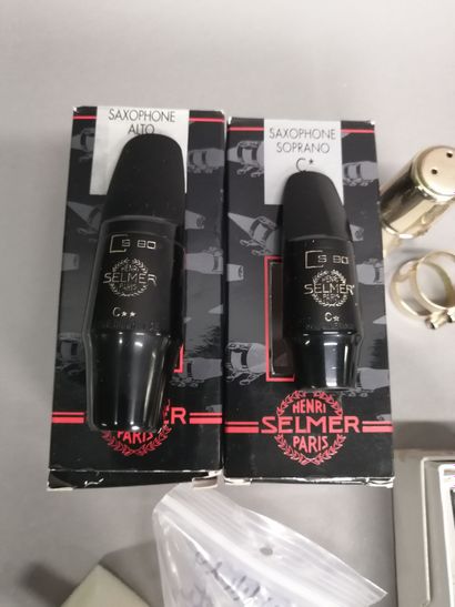 Set of new saxophone mouthpieces including:
1...