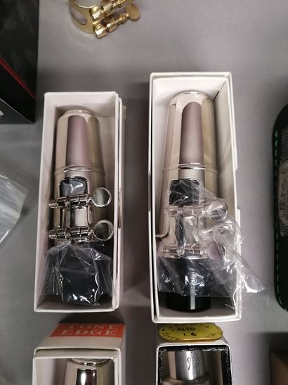 Set of new saxophone mouthpieces including:
1...