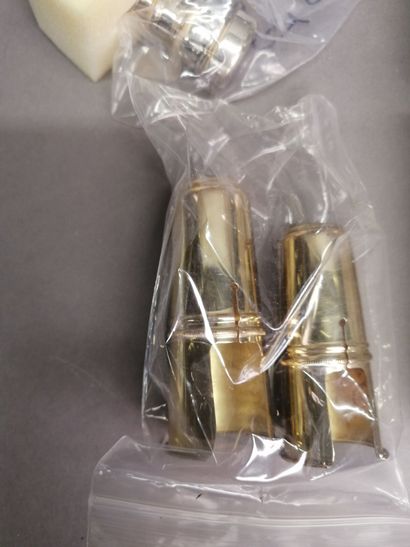 Set of new saxophone mouthpieces including:
1...
