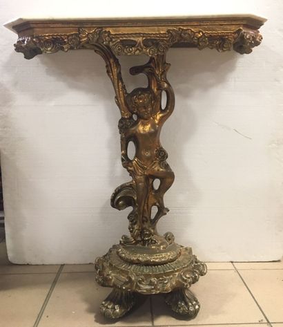 Console en bois doré, à décor de guirlande...