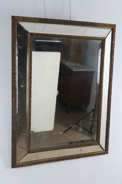 Miroir à parecloses en bois sculpté à baguettes...