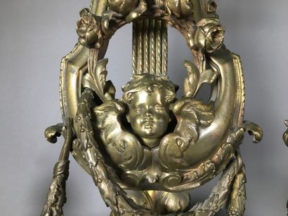 Paires de chenets en bronze à décor de lyres...