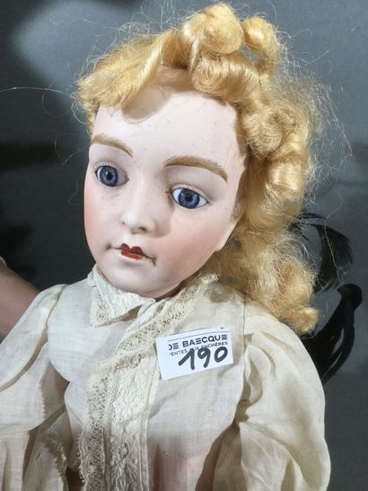 Poupée tête biscuit coulé, blonde aux yeux...