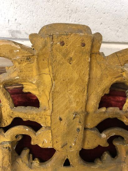 Mirror in a pedimented frame in gilded wood...