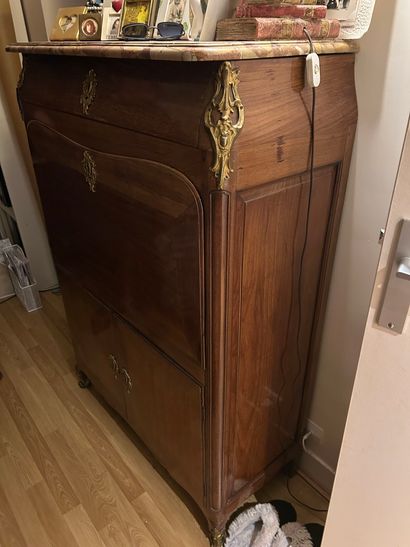 Solid mahogany desk opening to a recessed...