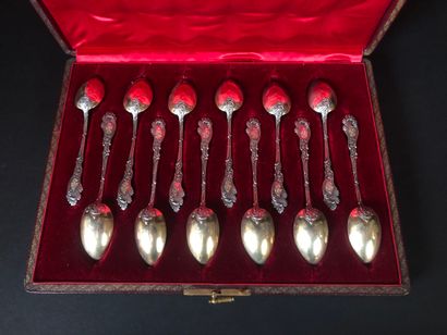 Twelve silver teaspoons (950 thousandths),...