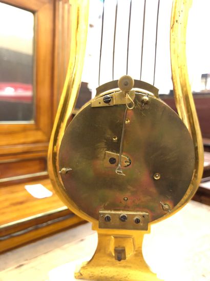 SMALL LYRUS HANGER in gilt bronze decorated...