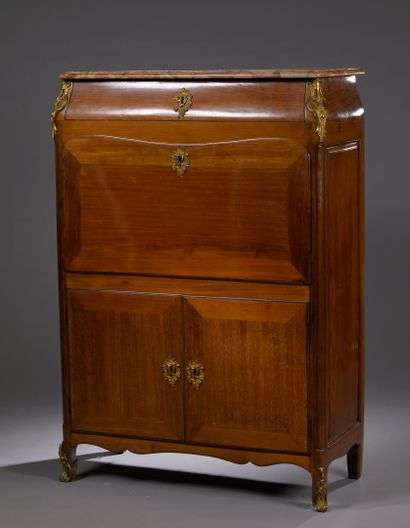 Solid mahogany desk opening to a recessed...