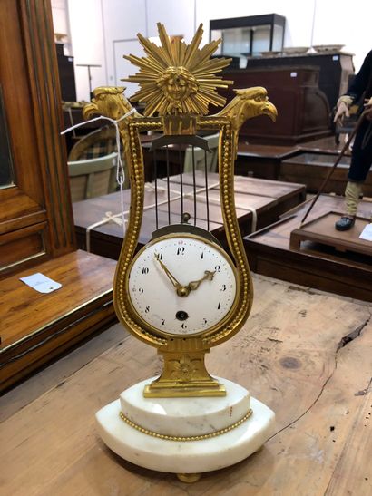 SMALL LYRUS HANGER in gilt bronze decorated...