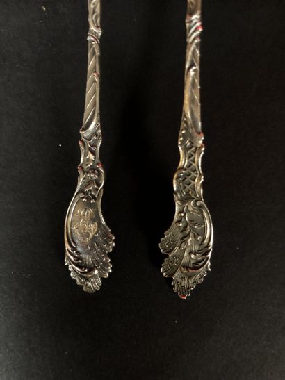 Twelve silver teaspoons (950 thousandths),...