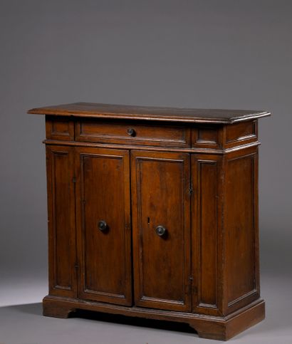 Moulded walnut sideboard opening to a drawer...