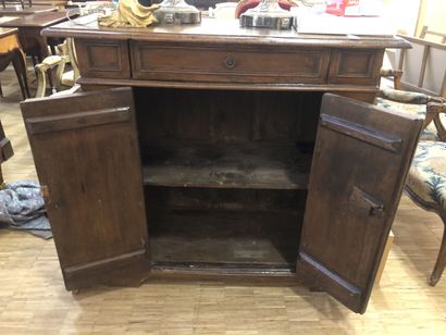 Moulded walnut sideboard opening to a drawer...