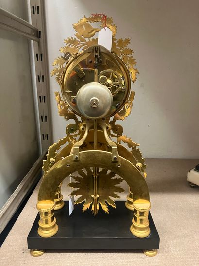Gilt bronze skeleton PORTICAL HANGER adorned...