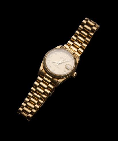 ROLEX 
Montre en or jaune 18K (750‰), collection...