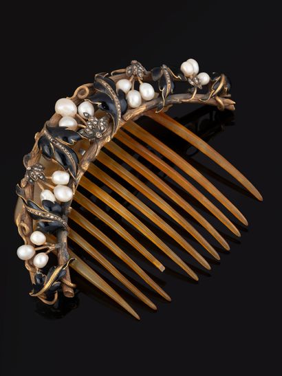 Peigne à chignon en or jaune 18K (750‰),...