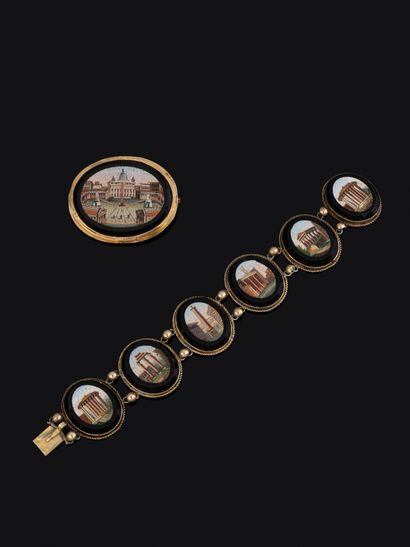 Parure composée d'une broche dans un entourage...