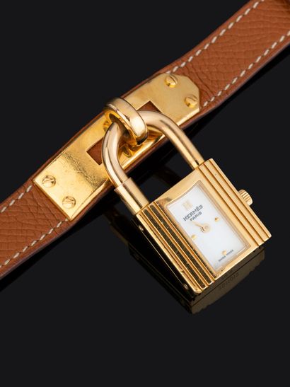 HERMES
Montre en métal plaqué or, collection...