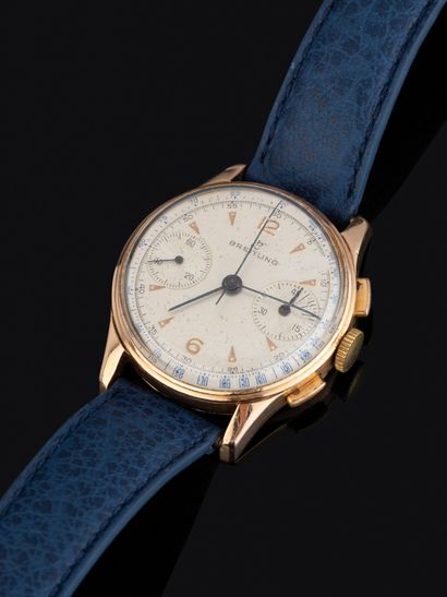 BREITLING
Montre chronographe en or jaune...