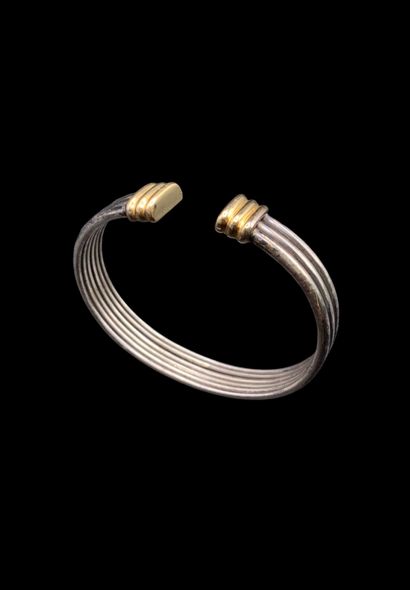 O.J. PERRIN
Bracelet jonc semi-rigide ouvert...