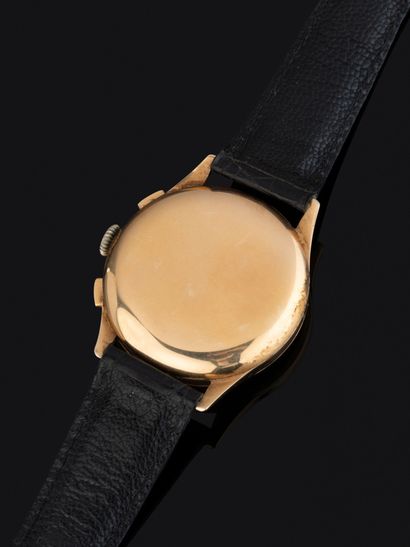 LONGINES
Montre chronographe en or jaune...