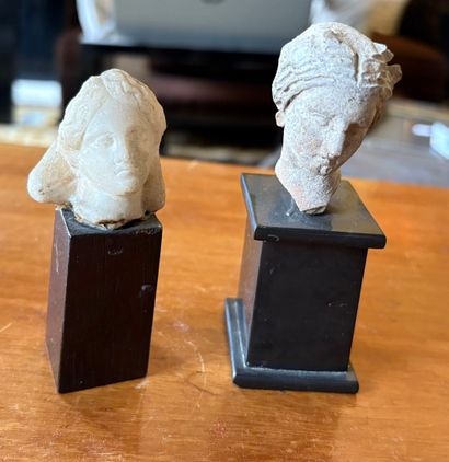 Lot including : 
- A half-veiled female head...