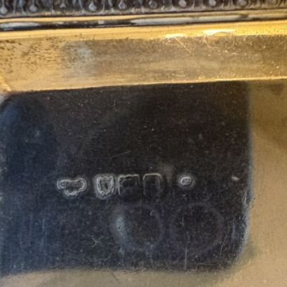 Ensemble en argent (800‰) à décor de frises...