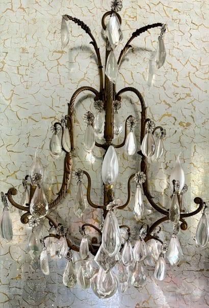 Suite de quatre appliques à trois lumières...