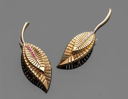 Pair of 18K (750/oo) yellow gold lapel clips...