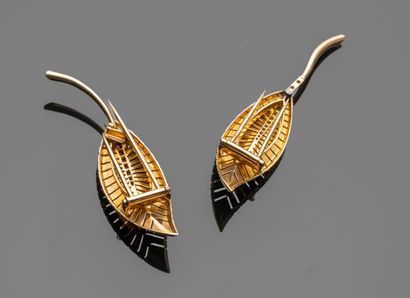 Pair of 18K (750/oo) yellow gold lapel clips...
