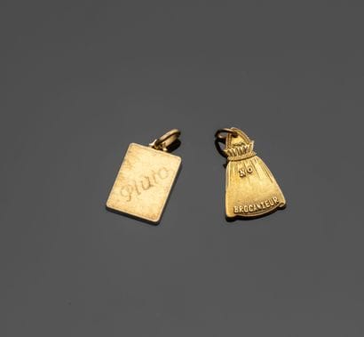 Two 18K (750‰) yellow gold medals one engraved...