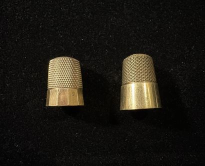 Two 14K yellow gold thimbles (585‰).
One...