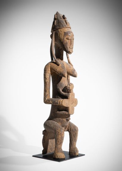 # BAMBARA, MALI
Maternité en bois dur à patine...