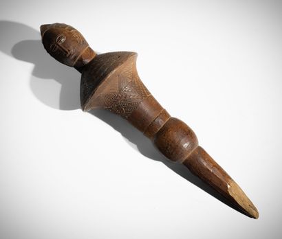 AOULÉ, CÔTE D'IVOIRE
Manche de chasse mouche...