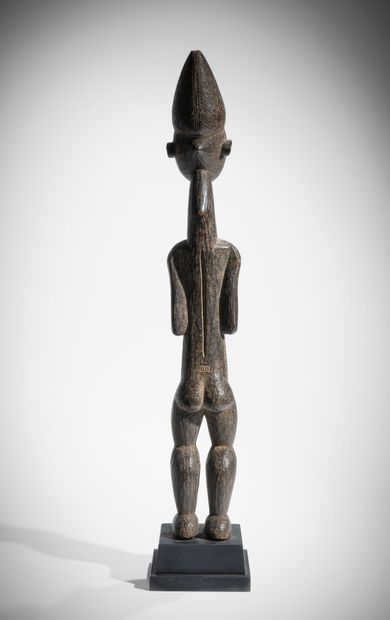 # KOULANGO, CÔTE D'IVOIRE
Statue féminine...