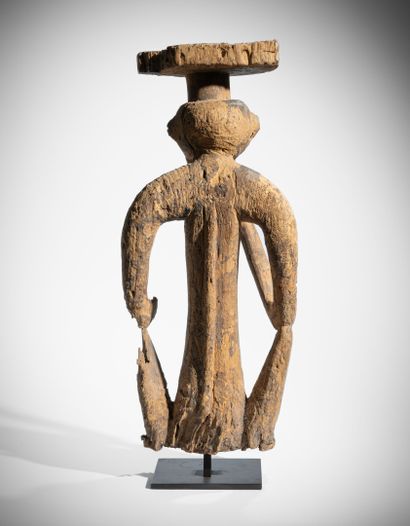 # FON, BÉNIN
Tabouret en bois dur à patine...