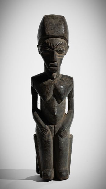 ¤ LOBI, BURKINA FASO
Statuette féminine assise...