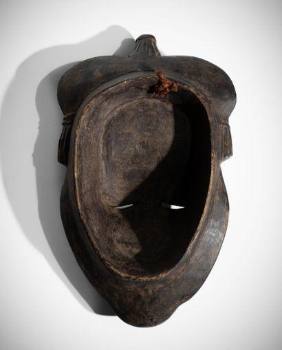 BAOULÉ, CÔTE D'IVOIRE
Masque en bois à patine...