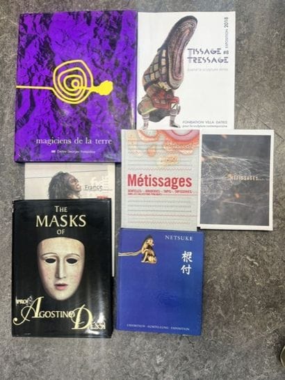 A set of seven volumes, including four books...