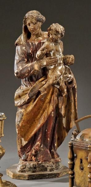 Statuette de Vierge à l'Enfant en bois polychrome...