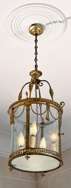 Lanterne ronde en bronze doré à pilastres,...