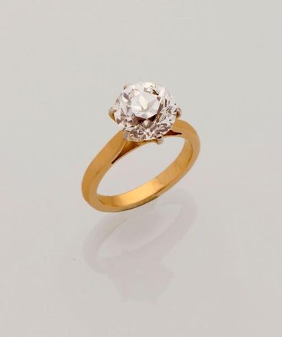 Bague solitaire en or jaune 18K (750/°°)...
