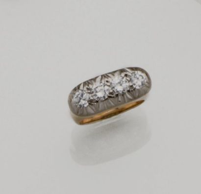 Bague jarretière en or 18K (750/°°) de deux...