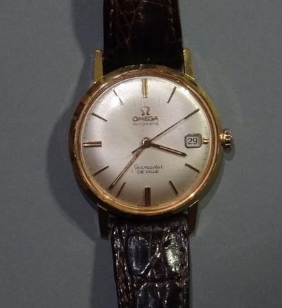 OMEGA
Montre bracelet d'homme en or jaune...