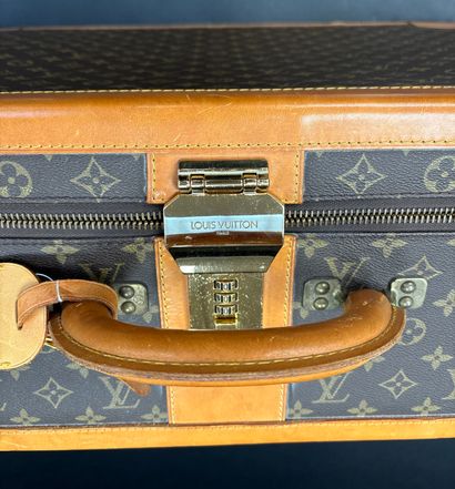 Louis Vuitton 
Stratos suitcase 
In monogrammed...
