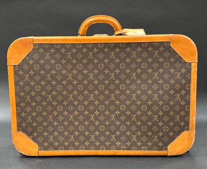 Louis Vuitton 
Stratos suitcase 
In monogrammed...