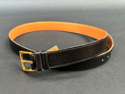 Hermès Paris
Black leather belt, camel interior,...