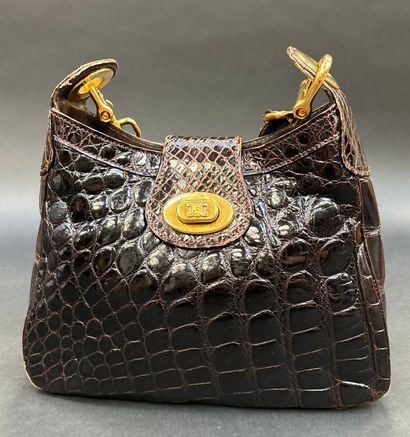 Vintage CELINE.
Shoulder bag in brown crocodile-style...