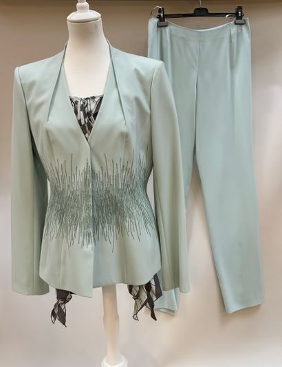 Thierry Mugler
Ice-blue polyester suit featuring...