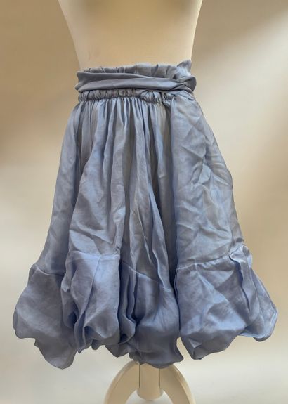 Ensemble de 5 bas, comprenant
4 jupes, 
Une...
