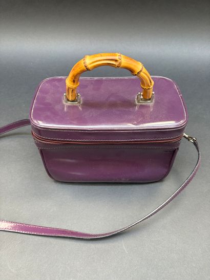 GUCCI
Vanity bag 
Purple vinyl exterior,...